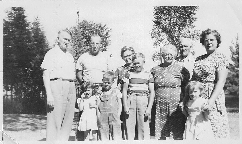 An outdoor family portrait from July 1951